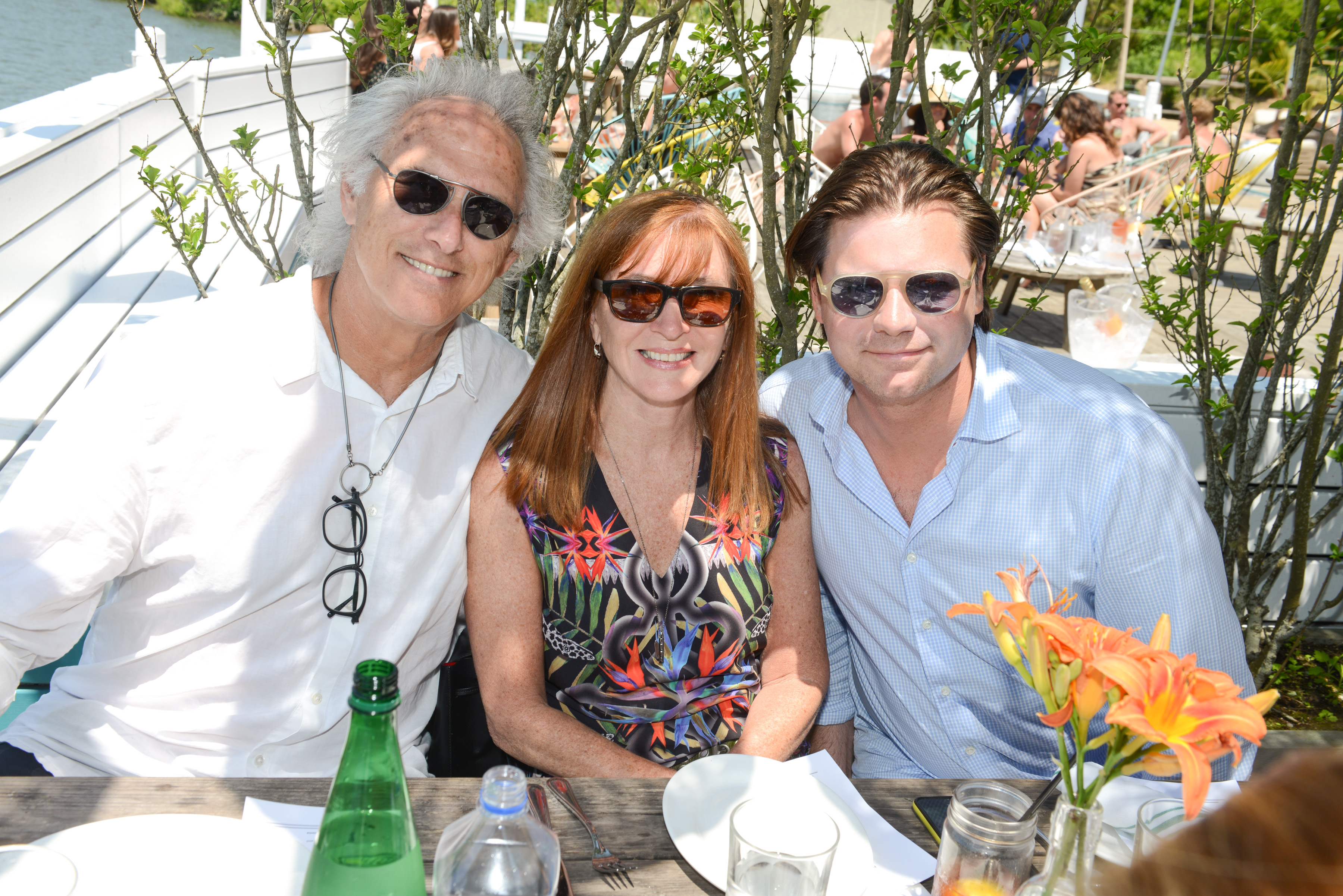 Eric Fischl, Nicole Miller, and James Salomon at the Parrish Art Museum's Contemporaries Circle Brunch at the Surf Lodge. Courtesy of Madison McGaw/BFA.