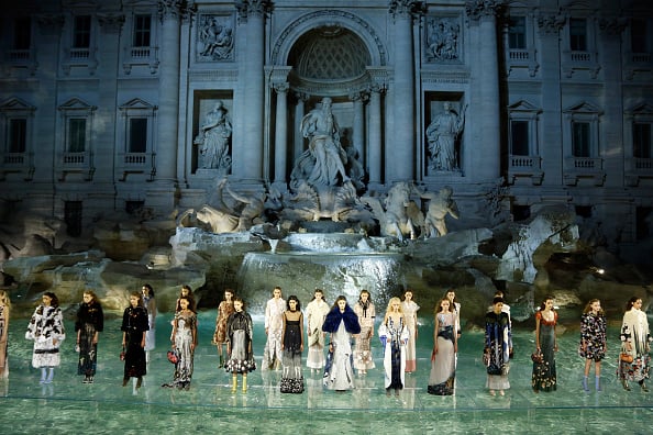 Models walk the runway at Fendi Roma 90 Years Anniversary fashion show at Fontana di Trevi on July 7, 2016 in Rome, Italy. Photo by Victor Boyko/Getty Images.
