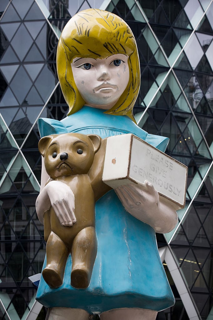 Damien Hirst's sculpture 'Charity' opposite the Gherkin building on July 16, 2015 in London, England. Courtesy of Rob Stothard/Getty Images.