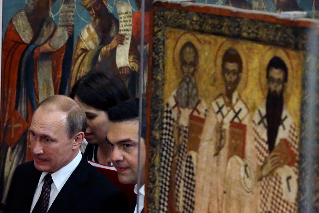 Greek Prime Minister Alexis Tsipras and Russian President Vladimir Putin visit the Byzantine and Christian museum in Athens, on May 27, 2016. Courtesy of THANASSIS STAVRAKIS/AFP/Getty Images.
