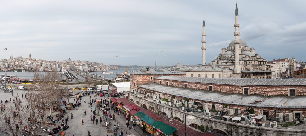 Panoramic view of Istanbul, Turkey, with Yeni Cami (the New Mosque) and Galata Bridge. Photo by Mstyslav Chernov, Creative Commons Attribution-Share Alike 3.0 Unported license.