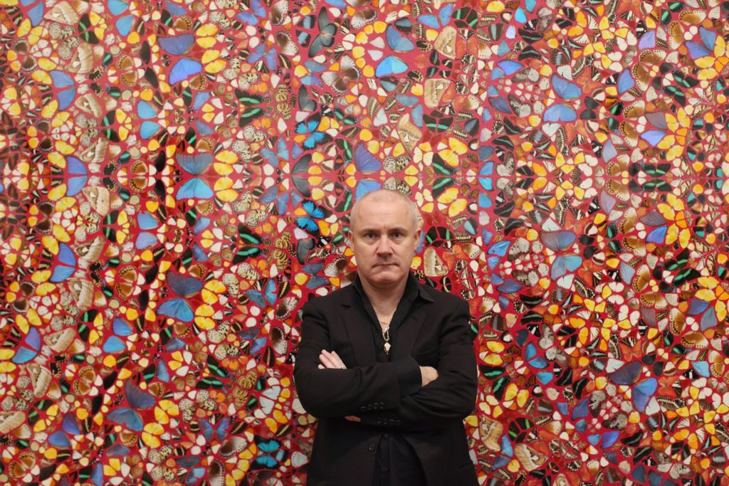 Damien Hirst at Tate Modern in 2012. Photo by Oli Scarff/Getty Images.