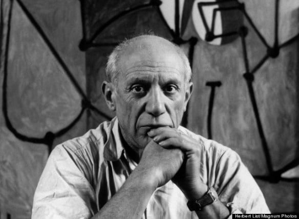 Pablo Picasso at his studio in front of "La Cuisine" 1948. Courtesy of Flickr via Creative Commons. 