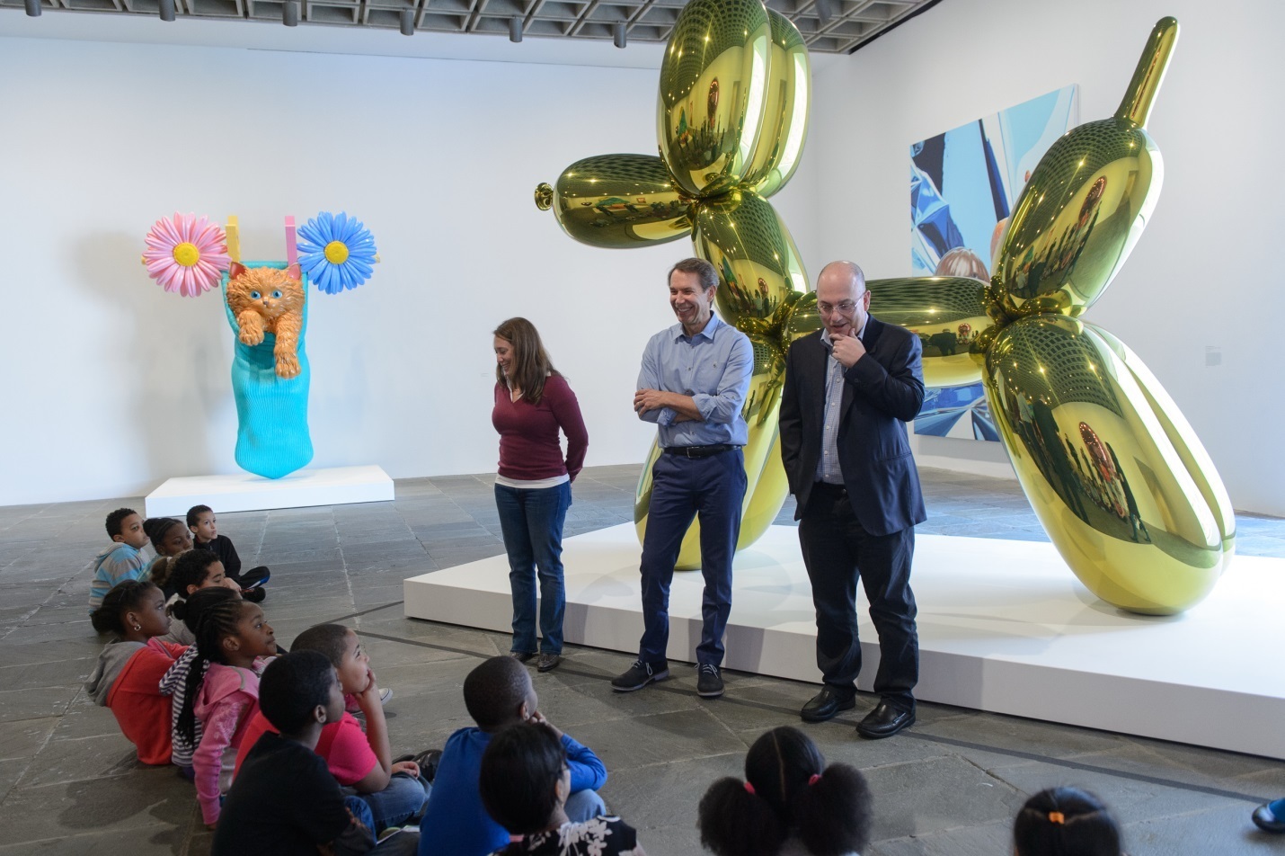 Artist Jeff Koons and collector Steve Cohen speak to kids at the Whitney Museum. Photo: courtesy Whitney Museum, New York.