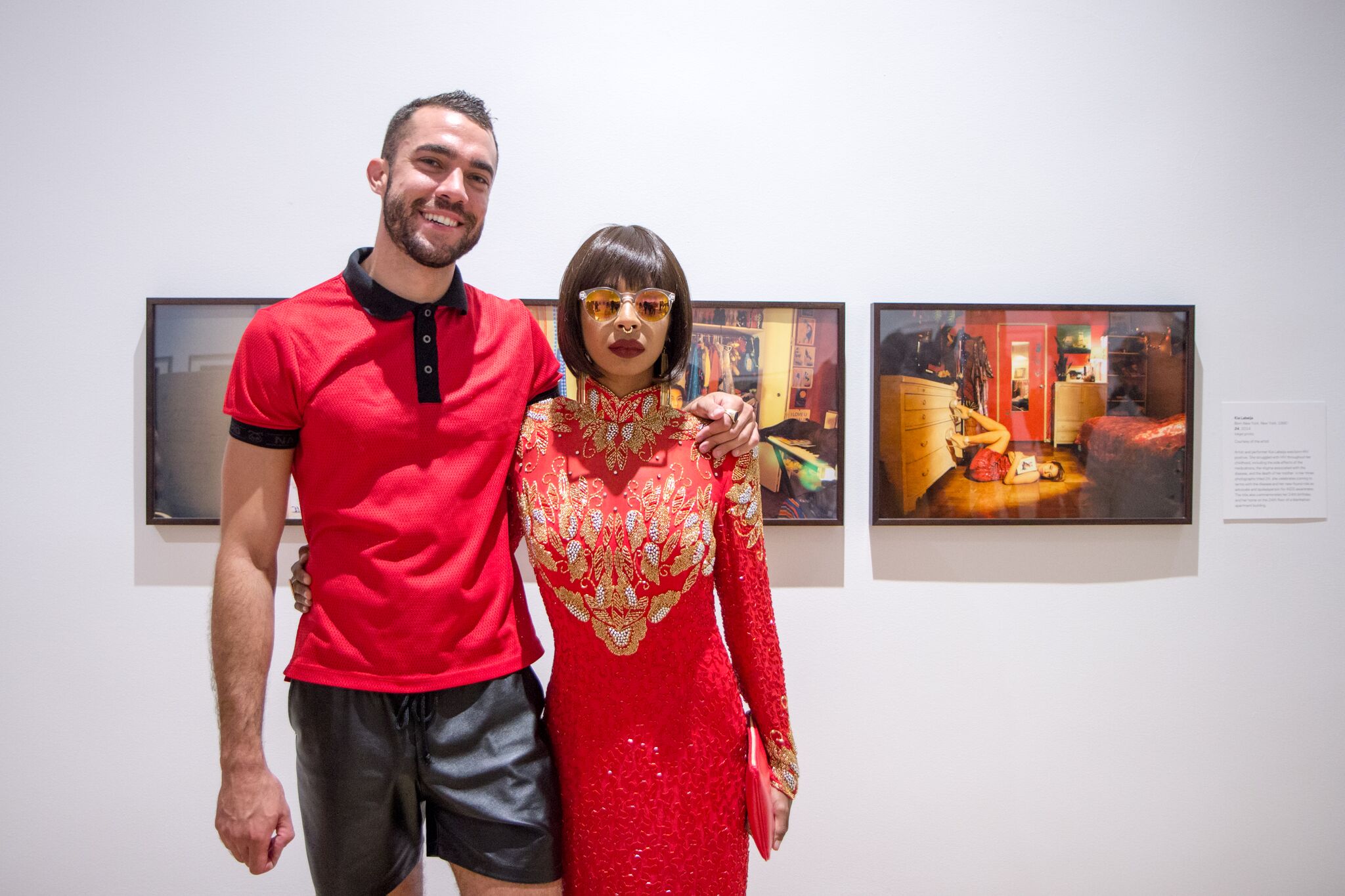 Visual AIDS Programs Director Alex Fialho and Artist Kia Labeija in front of her works. Photo: Bronx Museum/Lauren Click.