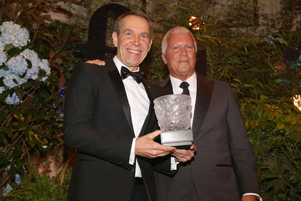 Jeff Koons and Larry Gagosian at the French Institute Alliance Francaise's Trophee des Arts Gala. Courtesy of photographer Sylvain Gaboury, © Patrick McMullan.