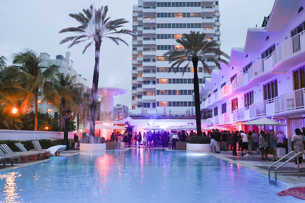 Guests hang out poolside at Worldwide Knowledge Wave presented by A$AP Mobb and Know Wave at the Shelborne Wyndham Grand South Beach hotel on December 4, 2015 in Miami, Florida. Courtesy of Rebecca Smeyne/Getty Images.