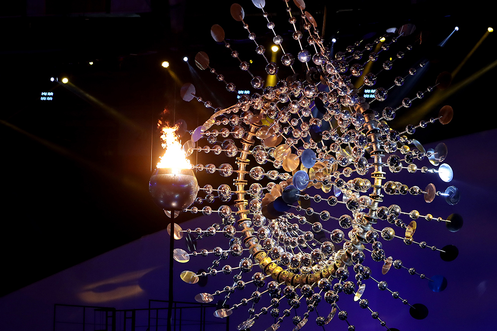 The Olympic Cauldron is lit alongside a sculpture by Anthony Howe at the Rio 2016 Olympic Games at Maracana Stadium. Courtesy of Christian Petersen/Getty Images.
