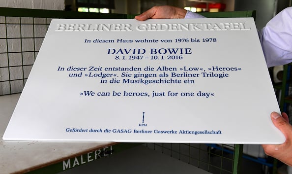 The porcelain plaque dedicated to musician David Bowie and reading 'In this house lived from 1976 to 1978 David Bowie. During this time the album Low, Heroes and Lodger have been created. They were storied in music history as Berlin Trilogy' is on display at the 'Koenigliche-Porzellan-Manufaktur Berlin' (KPM procellain manufacture) in Berlin on August 10, 2016. Photo: Tobias Schwarz/AFP/Getty Images. 
