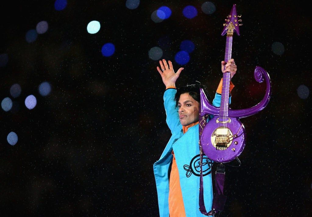 Prince performs during the Super Bowl in 2007. Photo Jonathan Daniel/Getty Images.