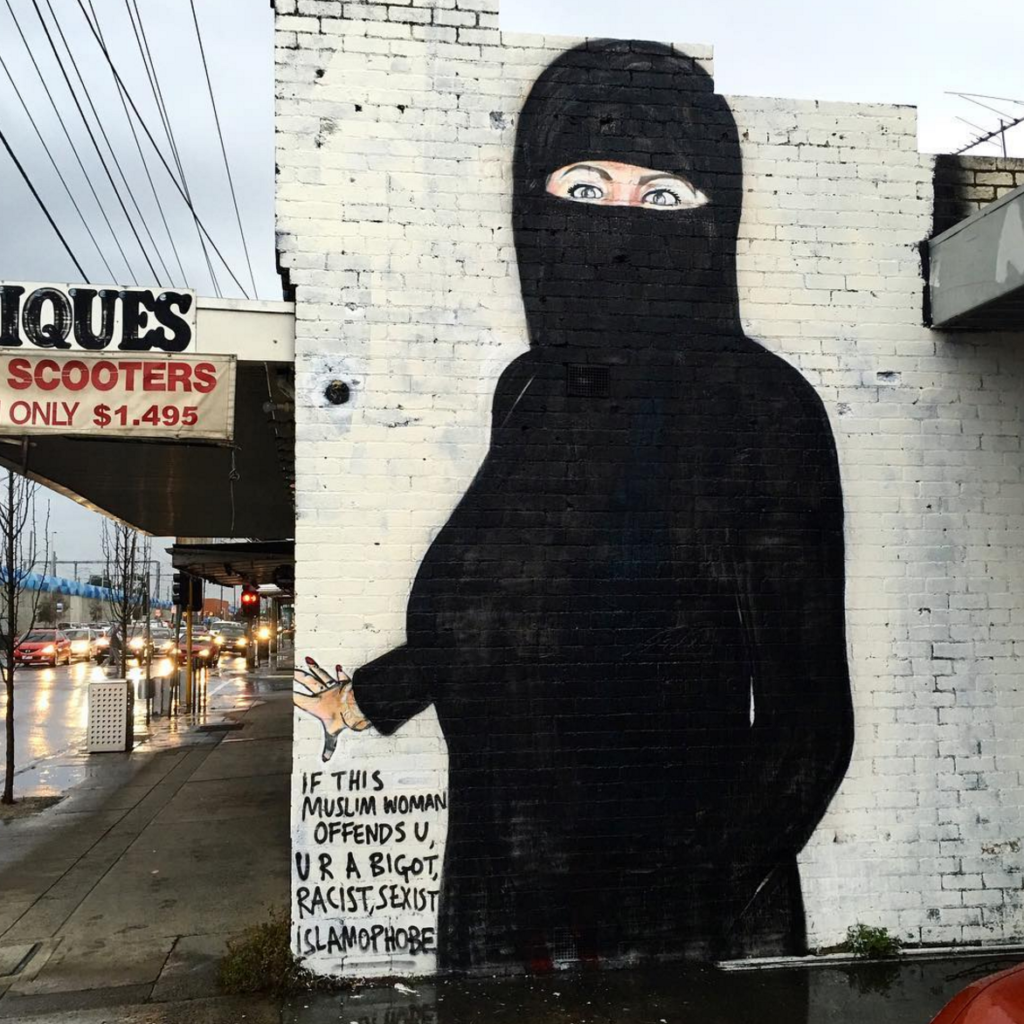 Hillary Clinton mural with added niqab. Photo via Instagram.