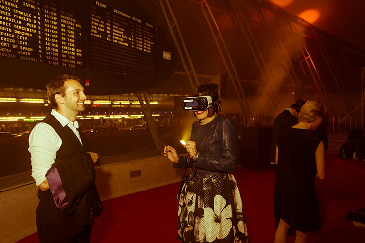 Guests enjoy a virtual reality experience at the Storefront for Art and Architecture’s Beyond Borders benefit gala at the TWA Terminal. Courtesy of Petros Pattakos/Storefront for Art and Architecture.