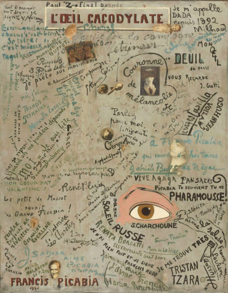 Francis Picabia (French, 1879–1953). L’Œil cacodylate (The Cacodylic Eye). 1921. Oil, enamel paint, gelatin silver prints, postcard, and cut-and-pasted printed papers on canvas, 58 1/2 x 46 1/4″ (148.6 x 117.4 cm). Centre Pompidou, Musée national d’art moderne – Centre de création industrielle, Paris. Purchase in honor of the era of Le Bœuf sur le Toit, 1967. © 2016 Artists Rights Society (ARS), New York/ADAGP, Paris. Photo: © CNAC/MNAM/Dist. RMN-Grand Palais/Art Resource, NY