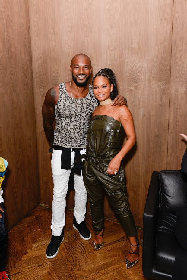 Tyson Beckford and Christina Milian attend <em>Interview</em> magazine's New York Fashion Week party. Courtesy of photographer Presley Ann/Patrick McMullan via Getty Images.