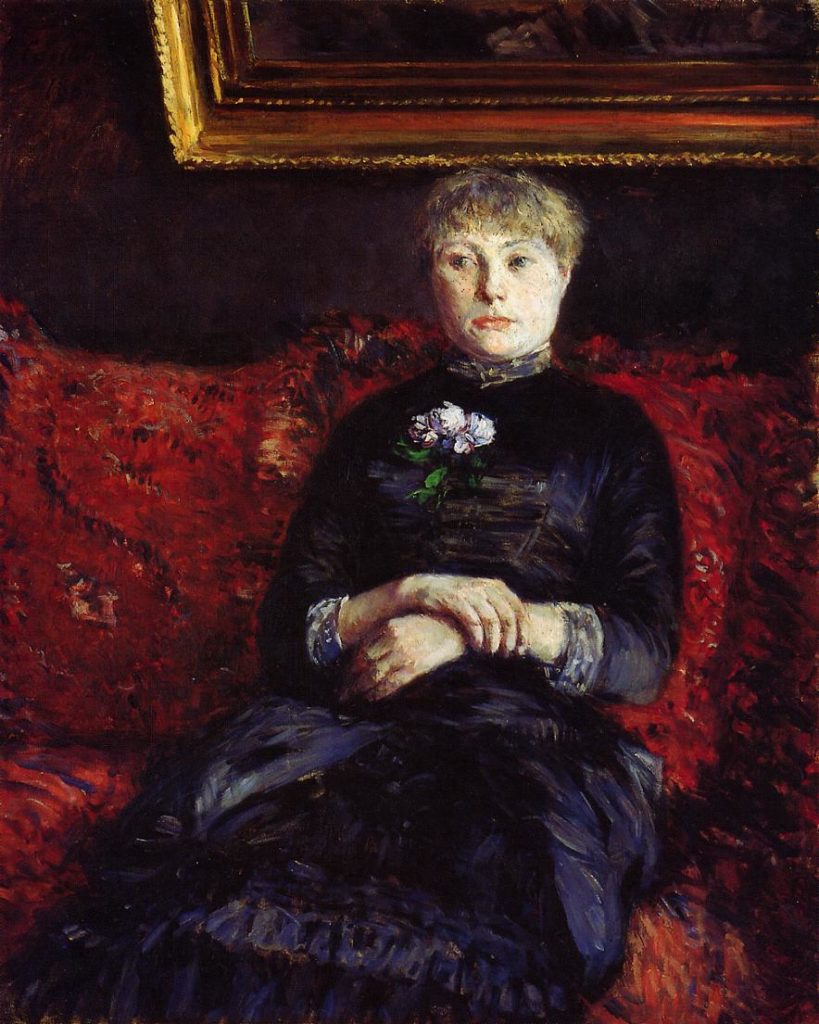 Gustave Caillebotte, Woman Sitting On A Red-Flowered Sofa (1882). Courtesy of Seattle Art Museum. 