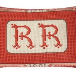 A needlepoint cushion emblazoned with Ronald Reagan's monogram was estimated to sell for just $1,500, but brought in $25,000. Courtesy of Christie's.