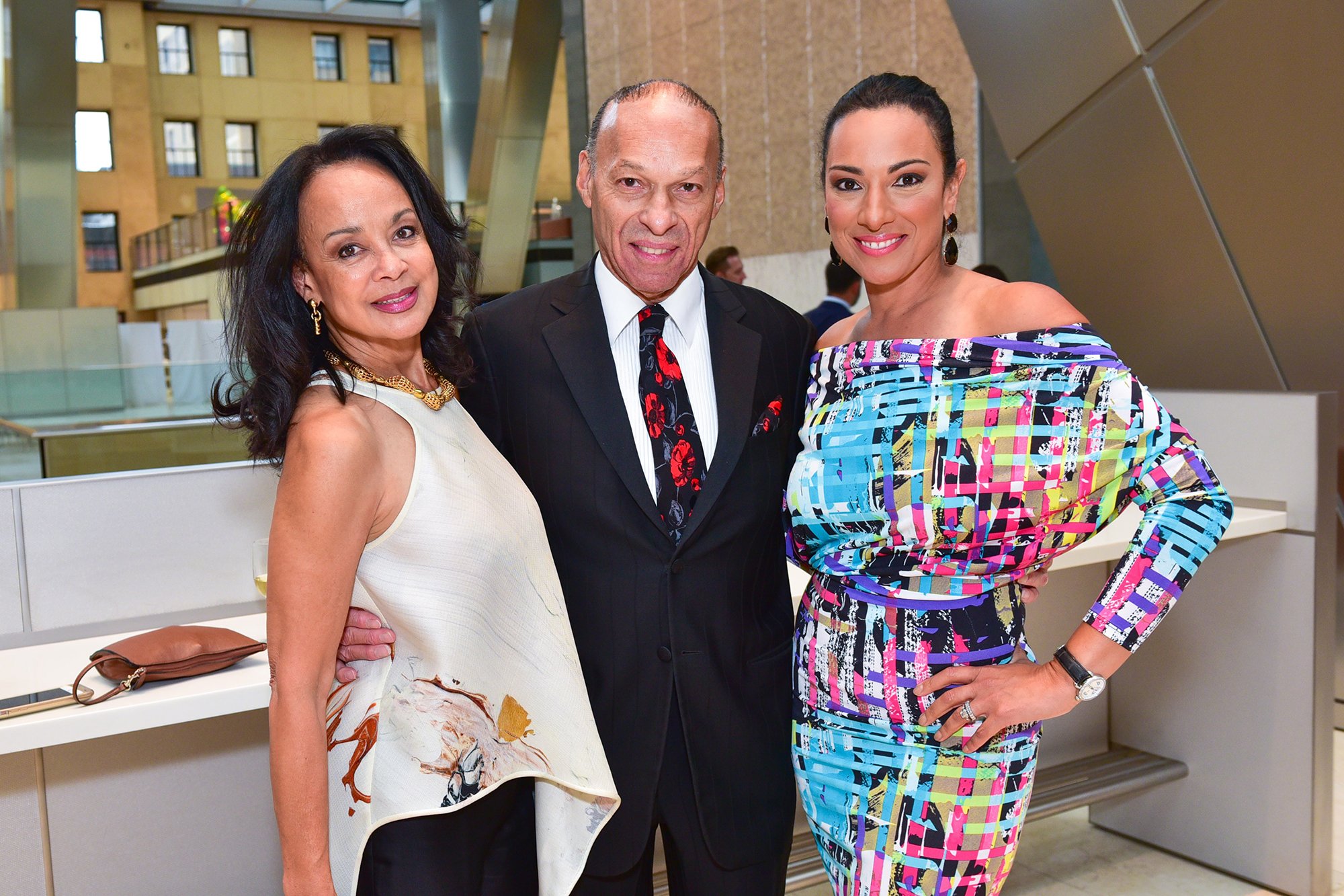 Alicia Bythewood, Daniel Bythewood Sr., and Michelle Miller at the Abstracted Black Tie Dinner Hosted by Pamela Joyner & Fred Giuffrida. Sean Zanni, © Patrick McMullan.