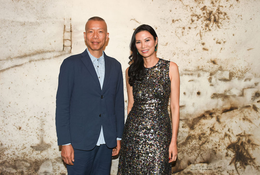 Cai Guo-Qiang and Wendi Murdoch at the release party for <eM>Sky Ladder: The Art of Cai-Guo-Qiang</em> at Sotheby's New York. Courtesy of BFA.