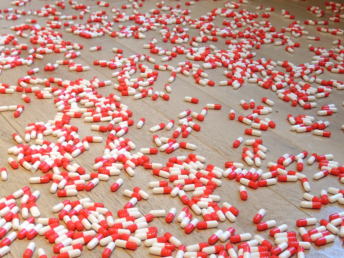 Carsten Höller, <em>Pill Clock (Red and White)</em> (2015) in "Take Me (I'm Yours)" at the Jewish Museum. Courtesy of Sarah Cascone. 