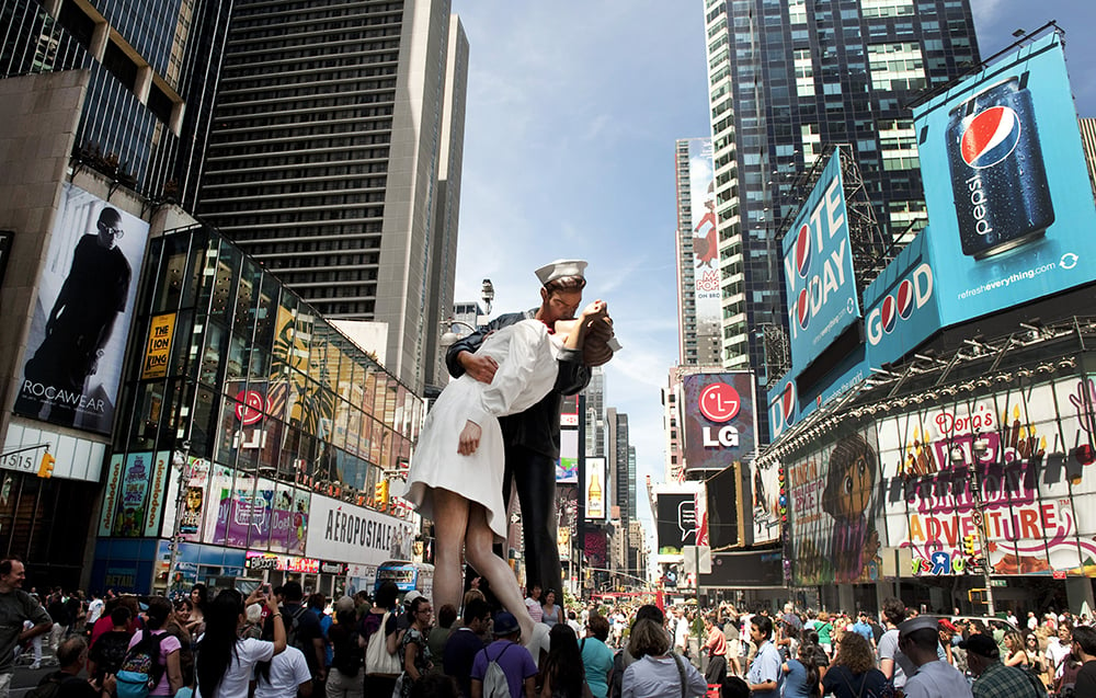 Hundreds gather in Times Square to view the 26-foot-tall Seward Johnson sculpture installed at the site of the historic LIFE Magazine photograph by Alfred Eisenstaedt. Don Emmert/AFP/Getty Images.