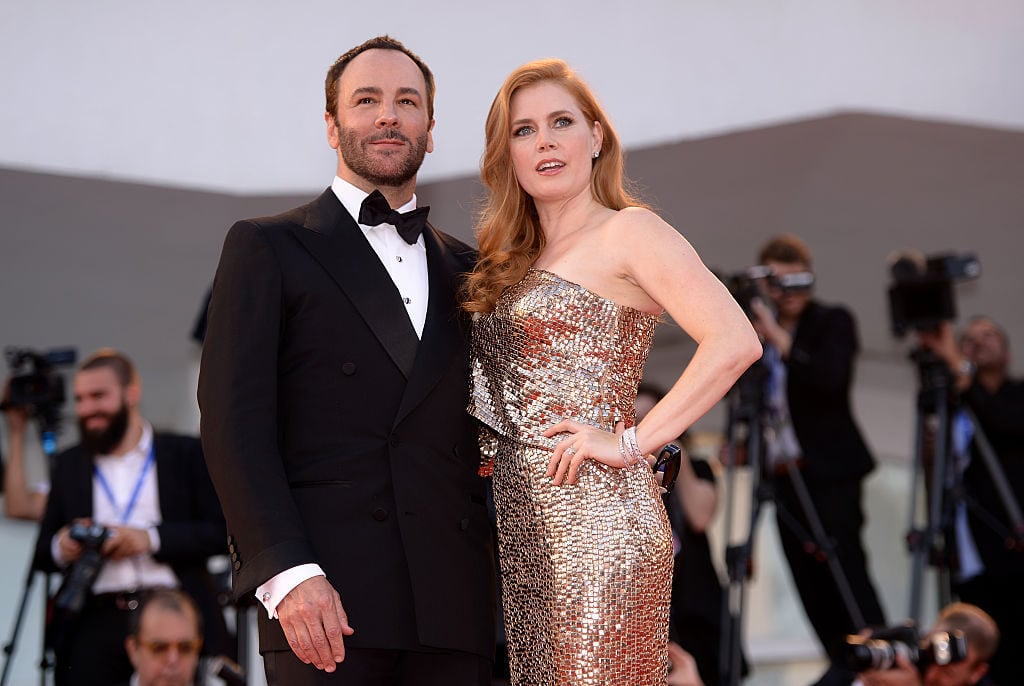 Actress Amy Adams and director Tom Ford arrive for the premiere of the movie 