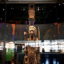The crown on the head of this sculpture by Nigerian artist Olowe of Ise helped inspire the design of the Smithsonian's National Museum of African American History and Culture. Courtesy of Getty Images.