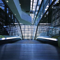 Steel and glass create patterns and reflections inside. Courtesy of Getty Images.