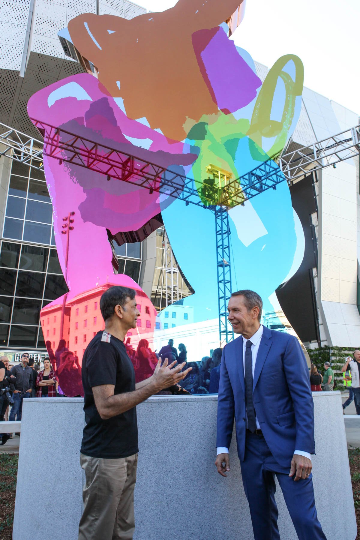 Sacramento Kings owner Vivek Ranadivé with artist Jeff Koons at the unveiling of his new sculpture <em>Coloring Book</em> at the Golden 1 Center. Courtesy of the Golden 1 Center. 