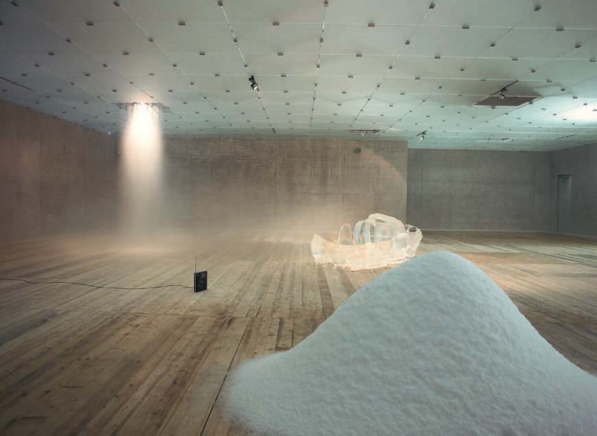 Pierre Huyghe, L’Expédition Scintillante, Acte 1 (2002). A work including a Weather Score, snow, rain, fog, programmed precipitation and an ice boat. © Pierre Huyghe. Photo Courtesy: Kub, Marcus Tretter/Nasher Sculpture Center. 