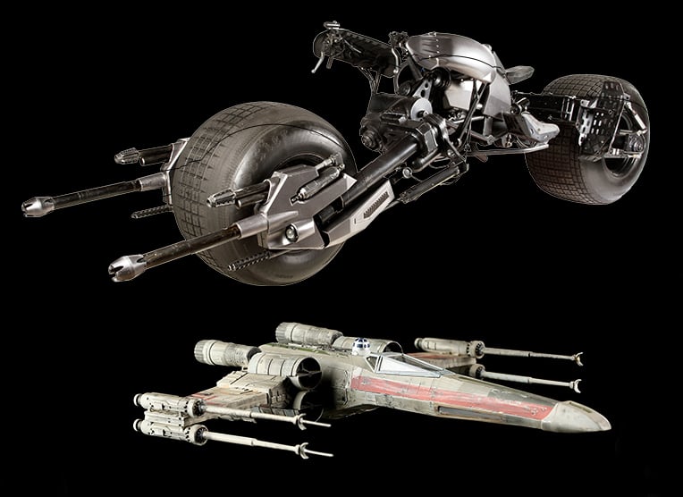 The Batpod from <Em>The Dark Night Rises</em> and a Star Wars TIE Fighter. Courtesy of the Prop Shop. 