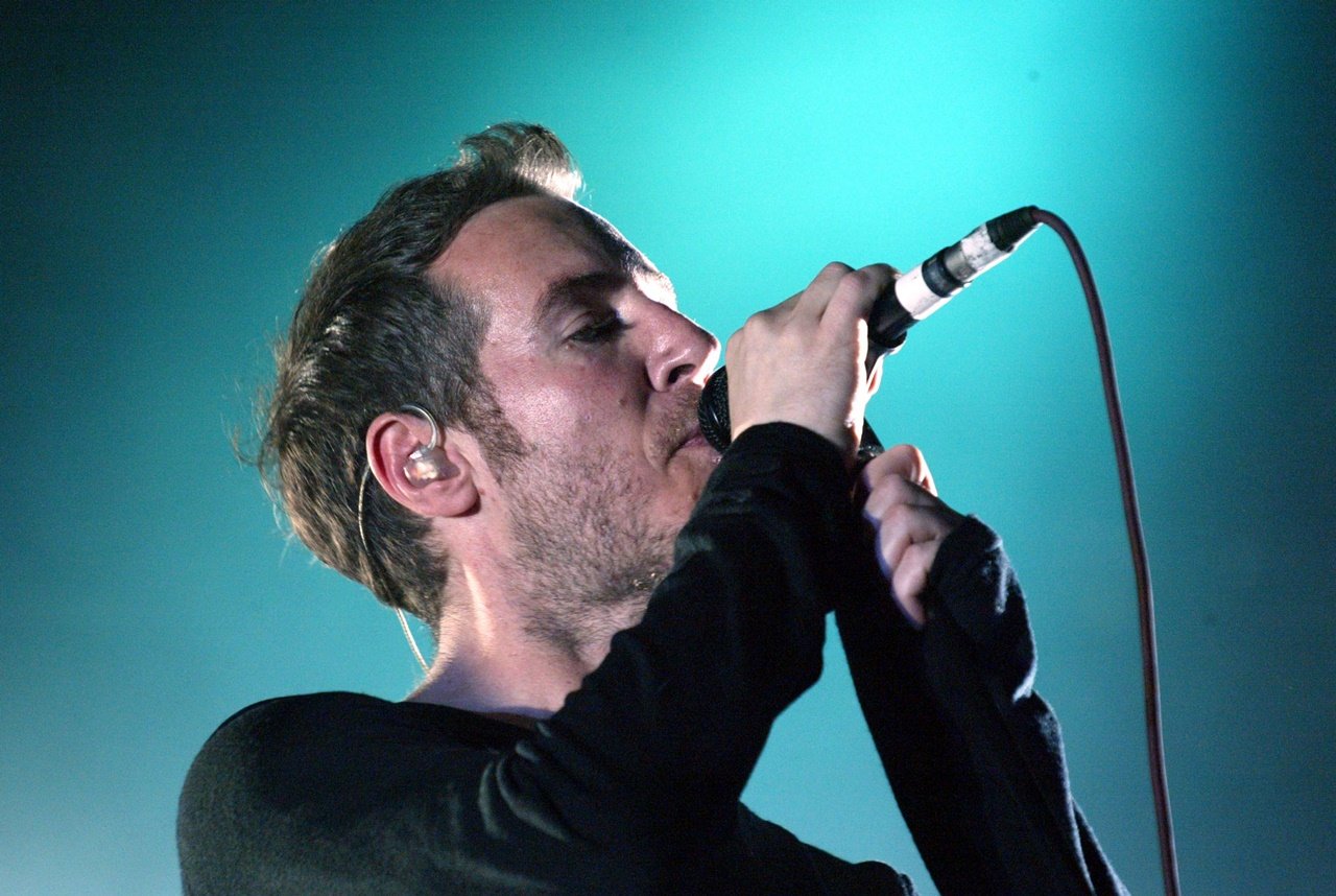 Robert del Naja of the British group Massive Attack at Queens Square, in Bristol, United Kingdom, August 25, 2003. Photo Carl De Souza/Getty Images.