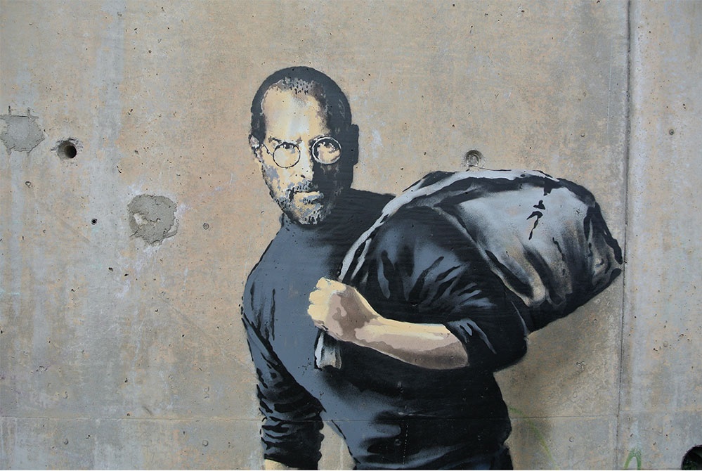 A Banksy mural depicting Steve Jobs, via banksy.co.uk.