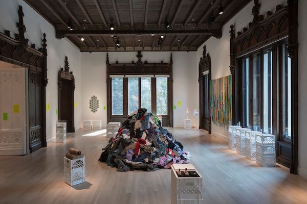 Exhibition view of "Take Me (I'm Yours)" at the Jewish Museum with Christian Boltanski's Dispersion in the center. Courtesy of photographer David Heald/the Jewish Museum.