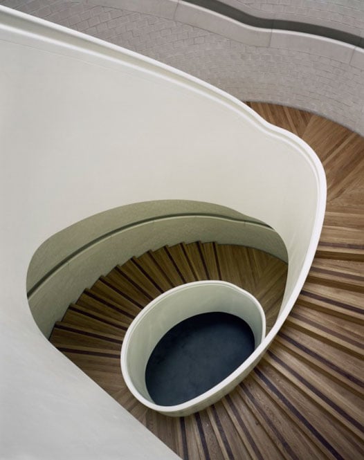 The interior of Newport Street Gallery features two mesmerizing winding staircases.Photo by Hélène Binet.