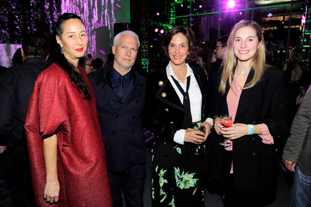 Angela Goding, Klaus Biesenbach, Lise Stolt Nielsen, and guest at the Armory Party at the Museum of Modern Art. Courtesy of Owen Hoffmann, © Patrick McMullan.