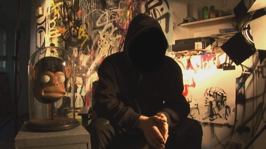 Banksy in the movie Exit Through The Gift Shop. Photo: Screenshot via YouTube. 