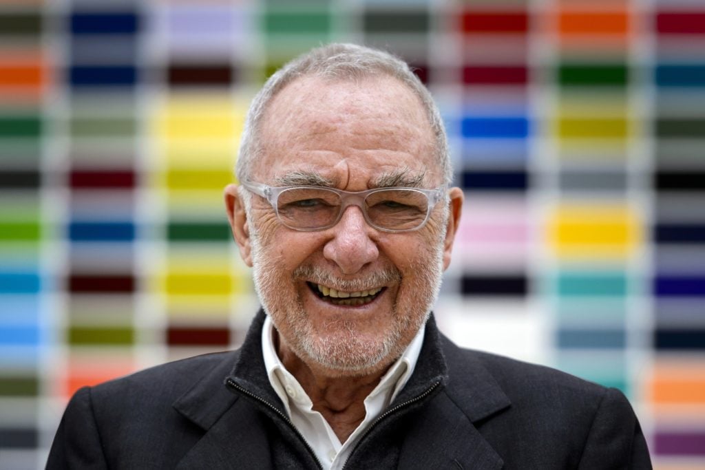 German artist Gerhard Richter laughs in front of one of his artworks at the Fondation Beyeler on May 17, 2014 in Riehen near Basel. Photo Fabrice Coffrini/AFP/Getty Images.
