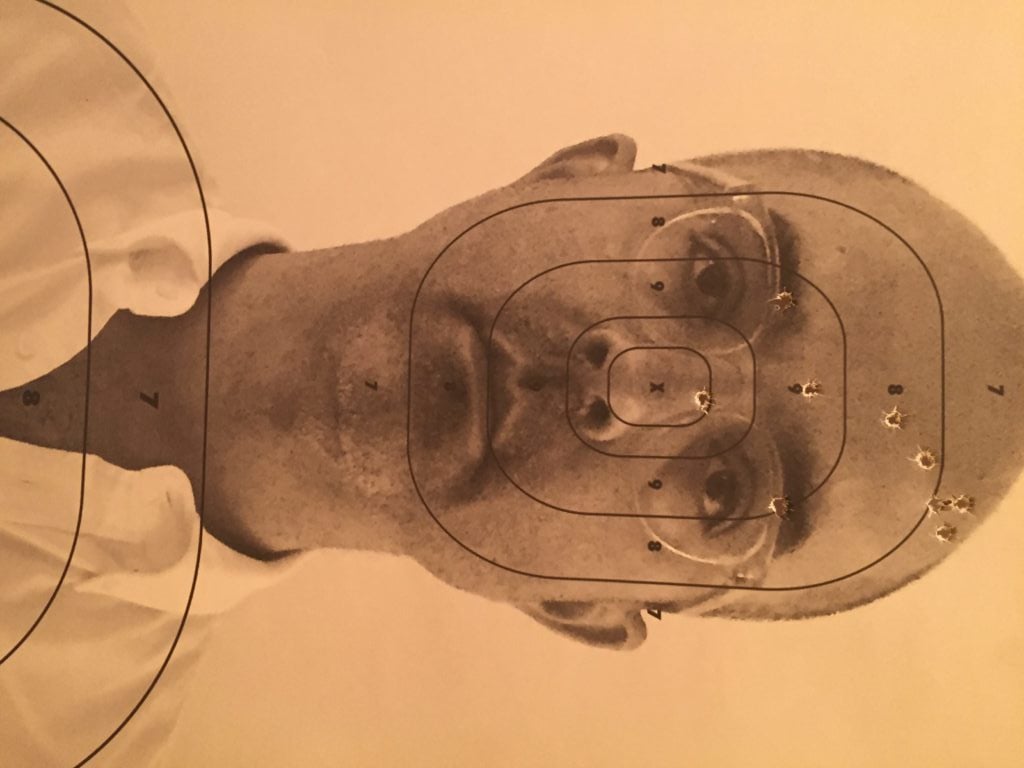 The author, printed on a target and shot through with holes by the author. Photo Brian Boucher.