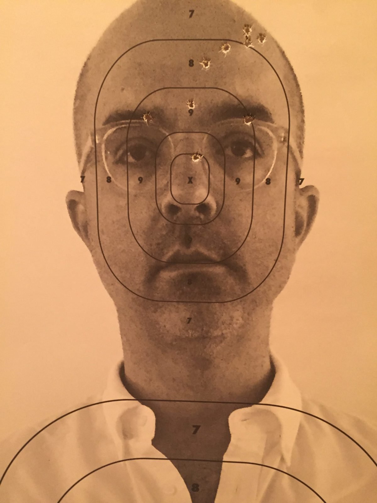 The author, printed on a target and shot through with holes by the author. Photo Brian Boucher.