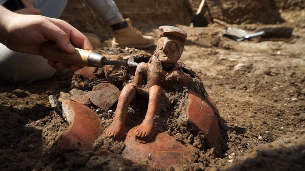 A 3,800-year-old jug found in Israel is being described as a Bronze Age The Thinker. Photo courtesy of the Israel Antiquities Authority/Clara Amit European Pressphoto Agency.
