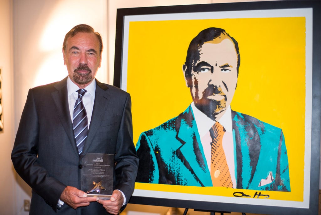 Jorge Pérez with his portrait by ABH. Courtesy of Nick Korniloff. 