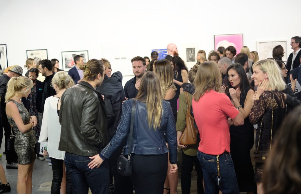 Guests at MAMA Gallery, west of Boyle Heights,in 2015. Courtesy of Michael Buckner/Getty Images for Art of Elysium.