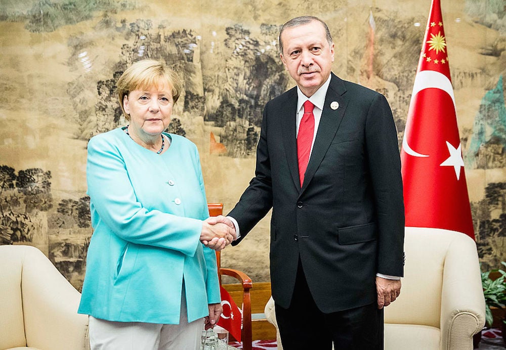 German chancellor Angela Merkel meets the Turkish president Recep Tayyip Erdogan shortly before the official start of the G20 meeting on September 4, 2016 in Hangzhou, China. Photo by Jesco Denzel/Bundesregierung via Getty Images.