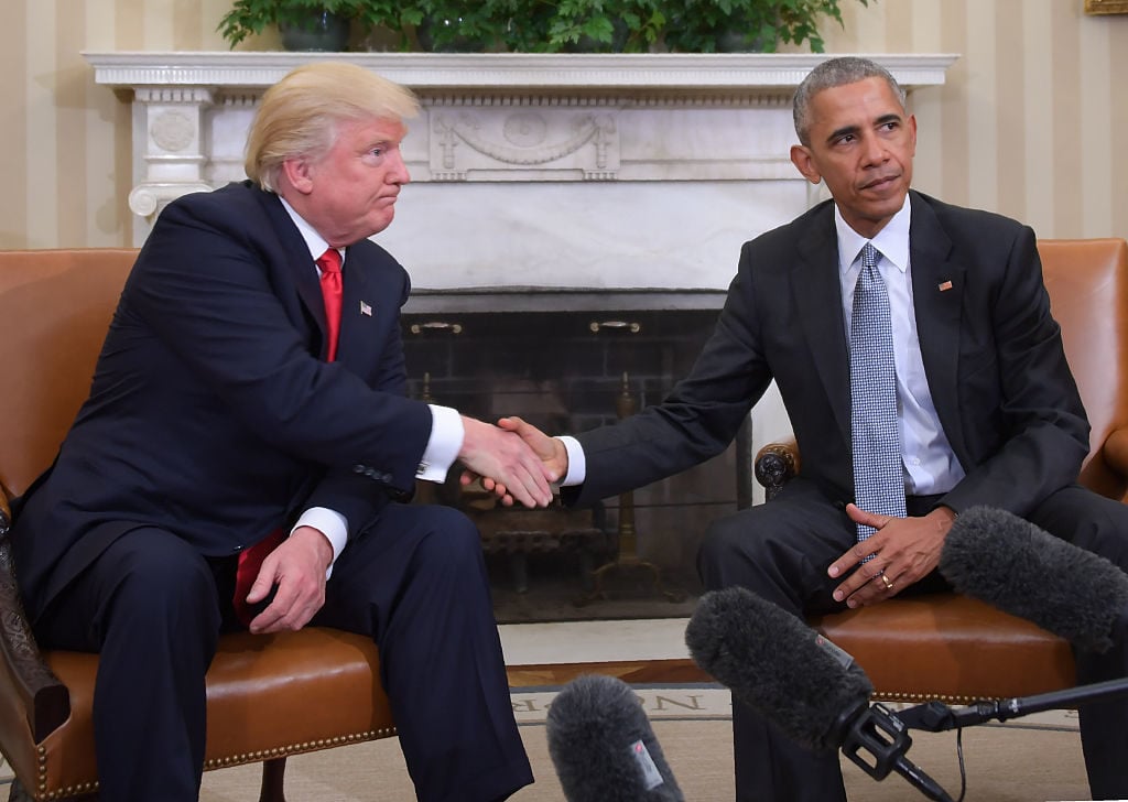 US President Barack Obama and President-elect Donald Trump shake hands during a transition planning meeting in the Oval Office at the White House on November 10, 2016 in Washington, DC. Photo Jim Watson/AFP/Getty Images.