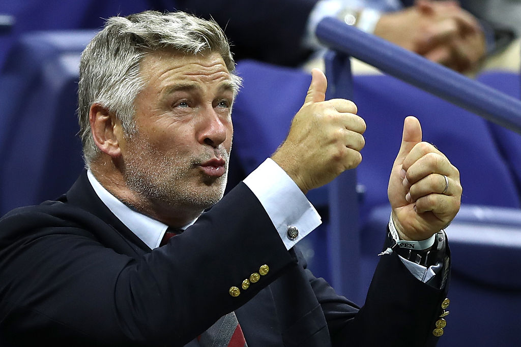 Alec Baldwin watches the first round Men's Singles match between Novak Djokovic of Serbia & Montenegro and Jerzy Janowicz of Poland on Day One of the 2016 US Open at the USTA Billie Jean King National Tennis Center on August 29, 2016 in the Flushing neighborhood of the Queens borough of New York City. Photo Elsa/Getty Images.