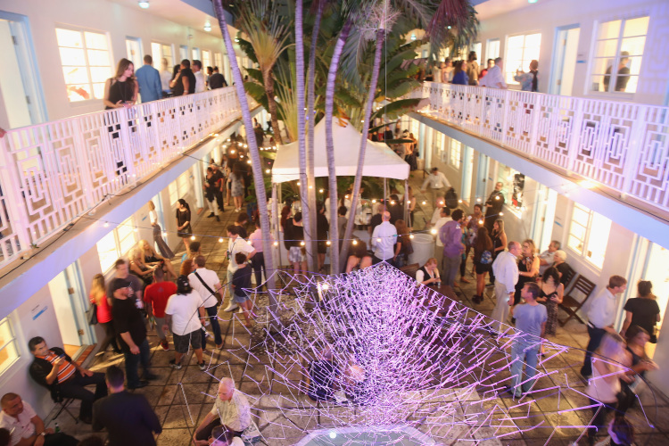Guests attend Aqua Art Miami VIP Preview at Aqua Art Miami at the Aqua Hotel on December 2, 2015 in Miami Beach, Florida. Courtesy of Aaron Davidson/Getty Images for Aqua Art Miami.