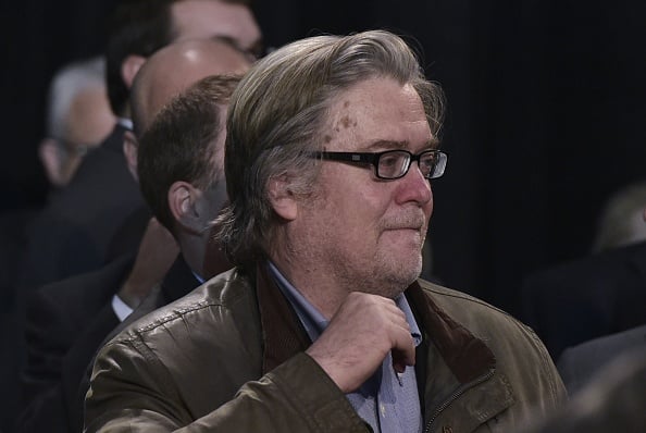 Stephen Bannon watches as Republican presidential nominee Donald Trump addresses the final rally of his 2016 presidential campaign at Devos Place in Grand Rapids, Michigan on November 7, 2016. Photo MANDEL NGAN/AFP/Getty Images.