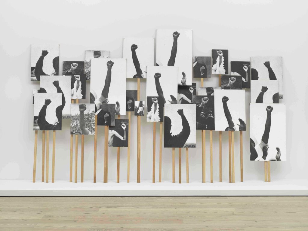 Annette Lemieux (b. 1957).Left Right Left Right, (1995).Thirty photolithographs and thirty pine poles, Dimensions variable. Whitney Museum of American Art, New York; Purchase, with funds from the Print Committee 2001.176a dd 