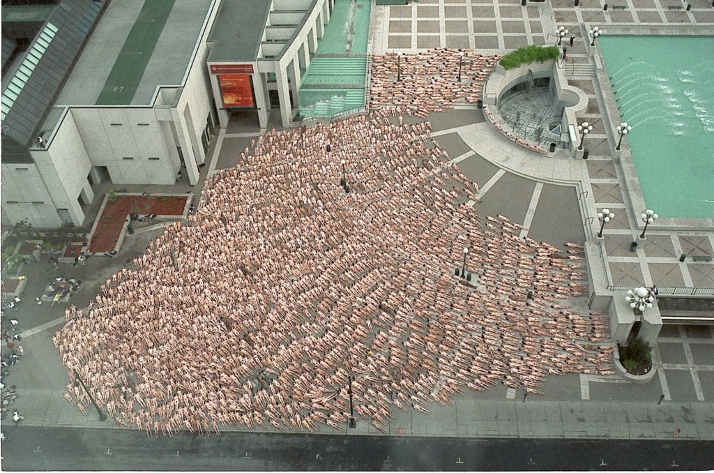 More than 2200 people pose nude for photographer Spencer Tunick, on the steps of the Montreal Museum of Fine Art in Montreal, Canada, May 26, 2001. Photo by Jean Therroux/Getty Images.