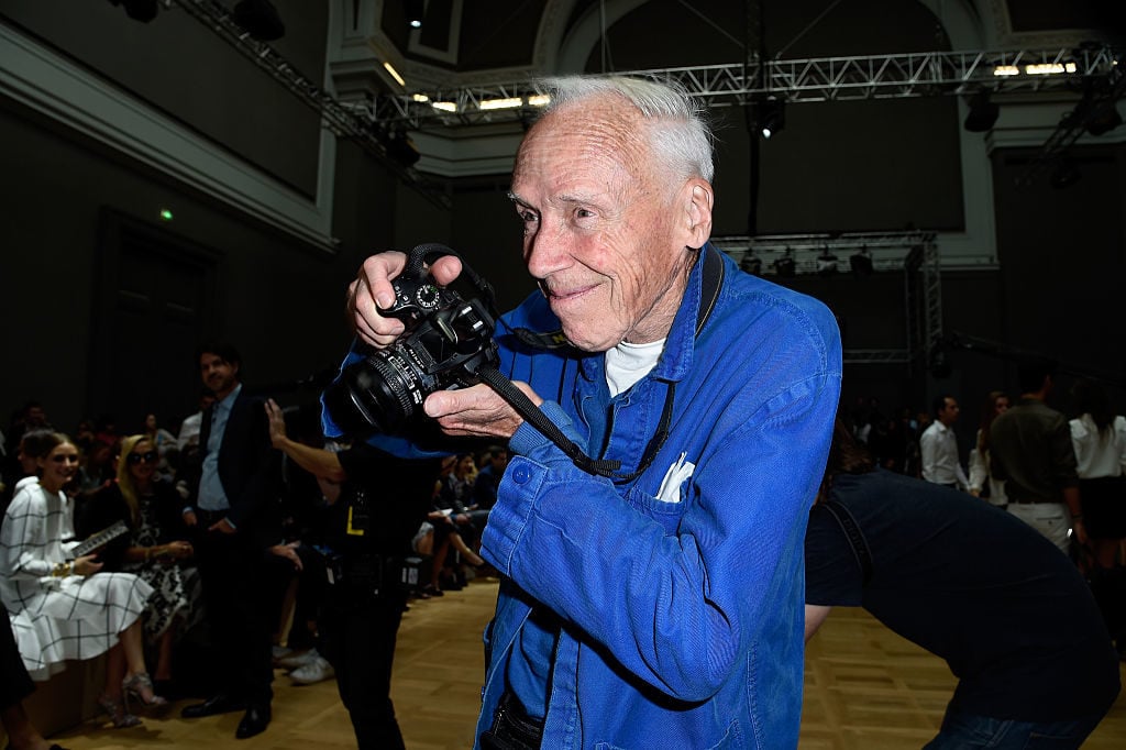 Photographer Bill Cunningham attends Paris Fashion Week in 2014. Photo by Pascal Le Segretain/Getty Images.